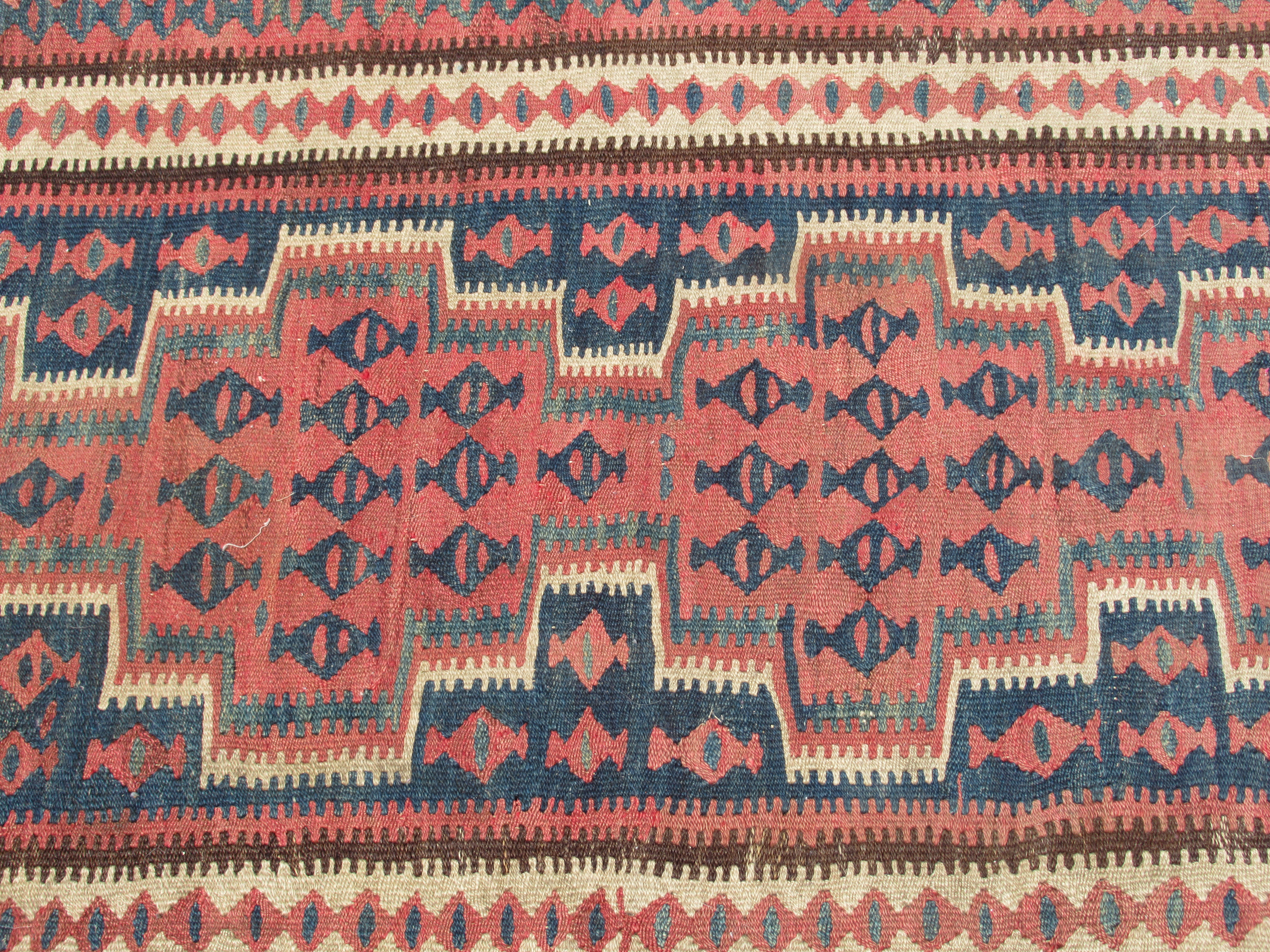 A Turkish Kelim rug, decorated with repeating geometric and other designs, on a brown ground  54" - Bild 2 aus 5