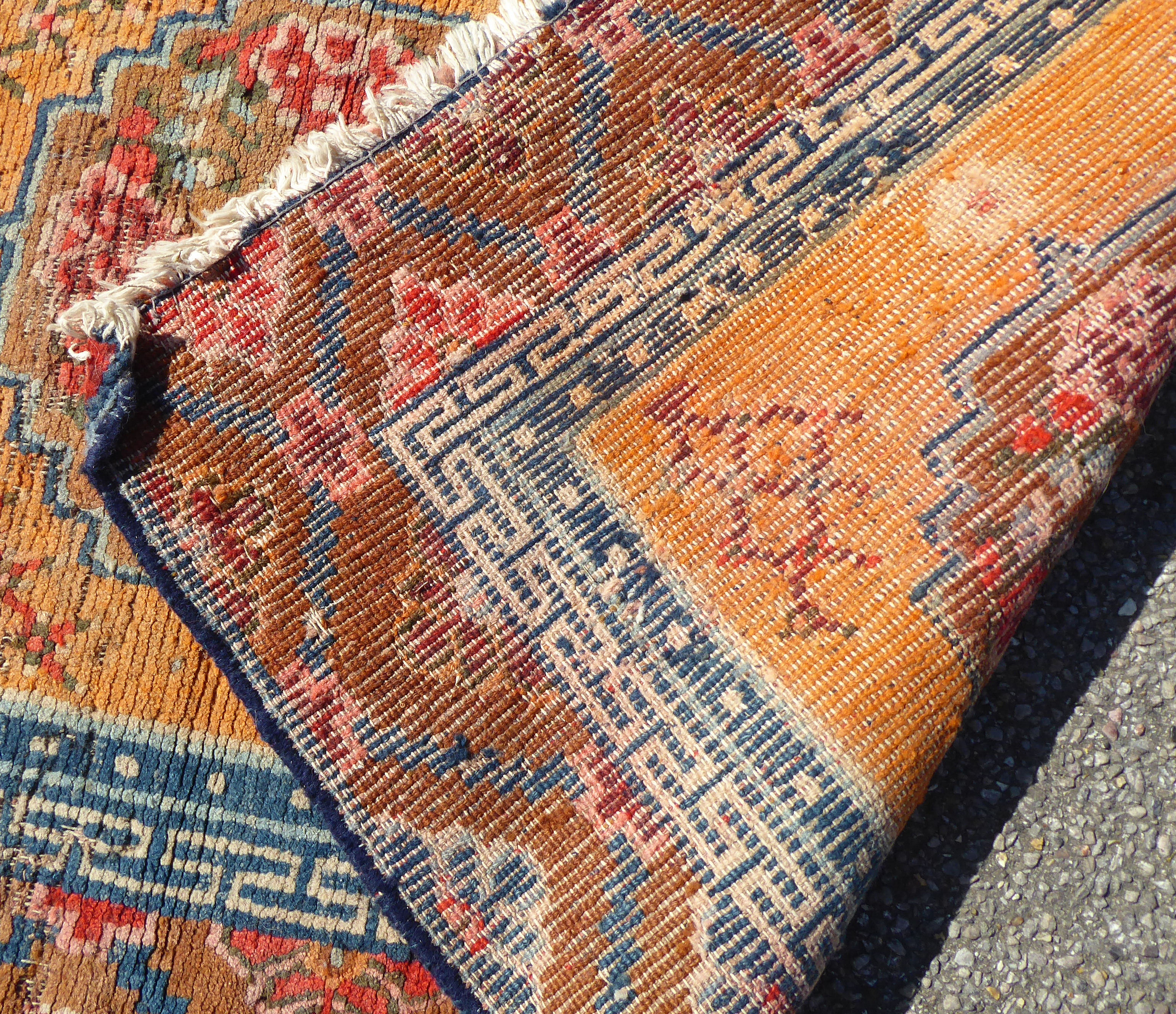 A 19thC Chinese Ning Zia rug with three medallions on a caramel coloured ground  54" x 29" - Bild 5 aus 5