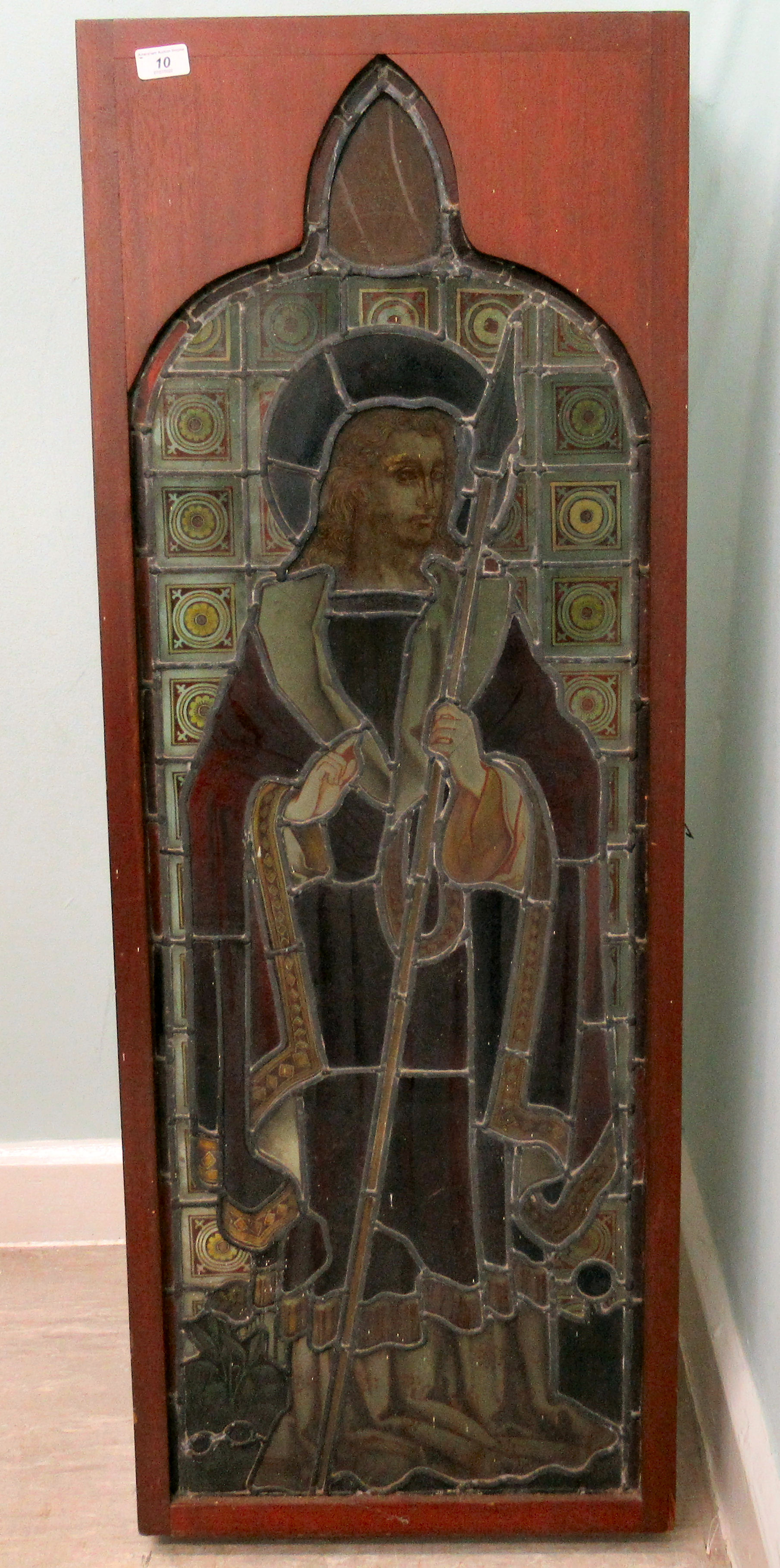 A 19thC coloured, lead glazed window, featuring a standing religious figure  46"h  17"w in a