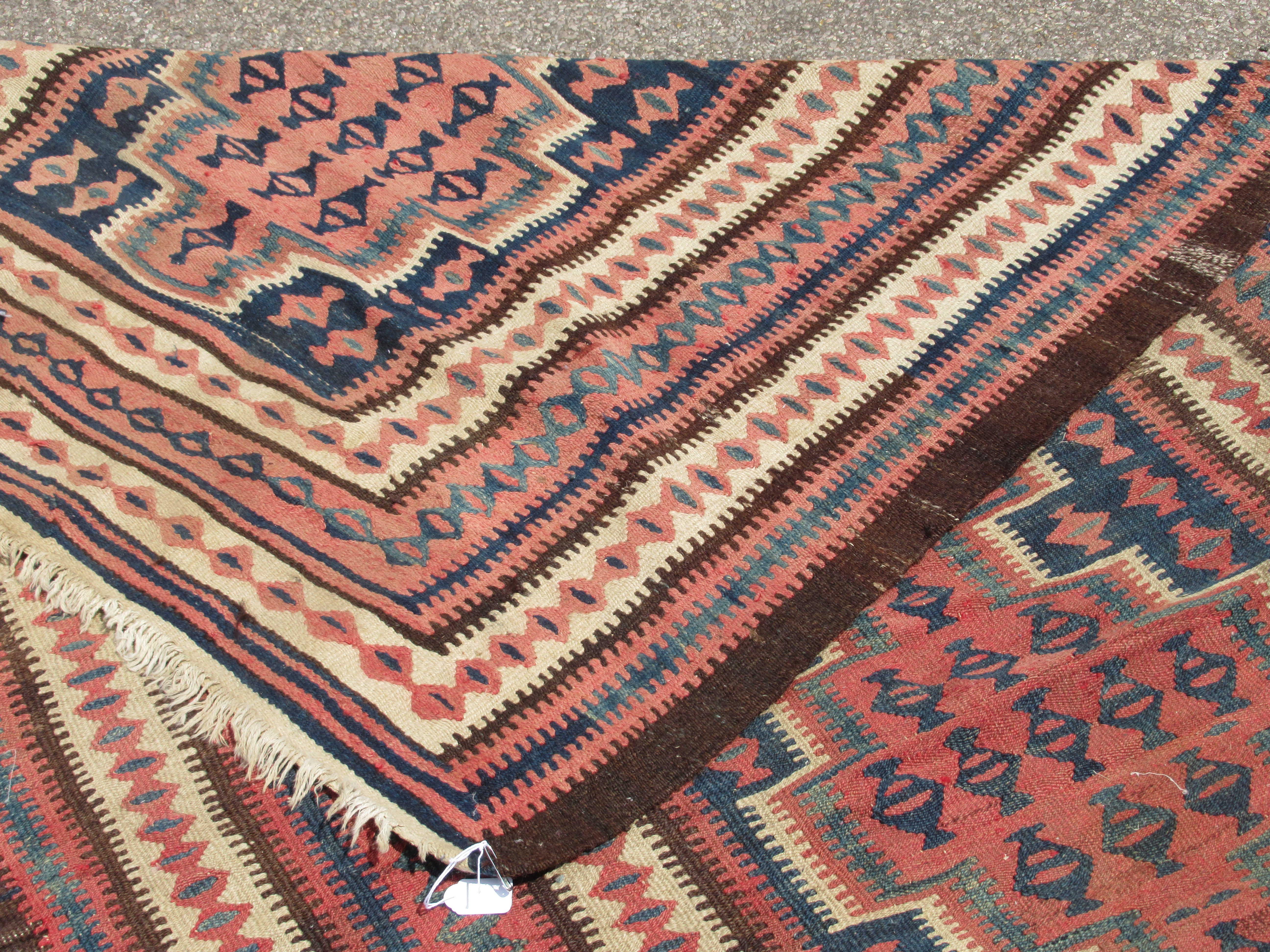 A Turkish Kelim rug, decorated with repeating geometric and other designs, on a brown ground  54" - Bild 5 aus 5