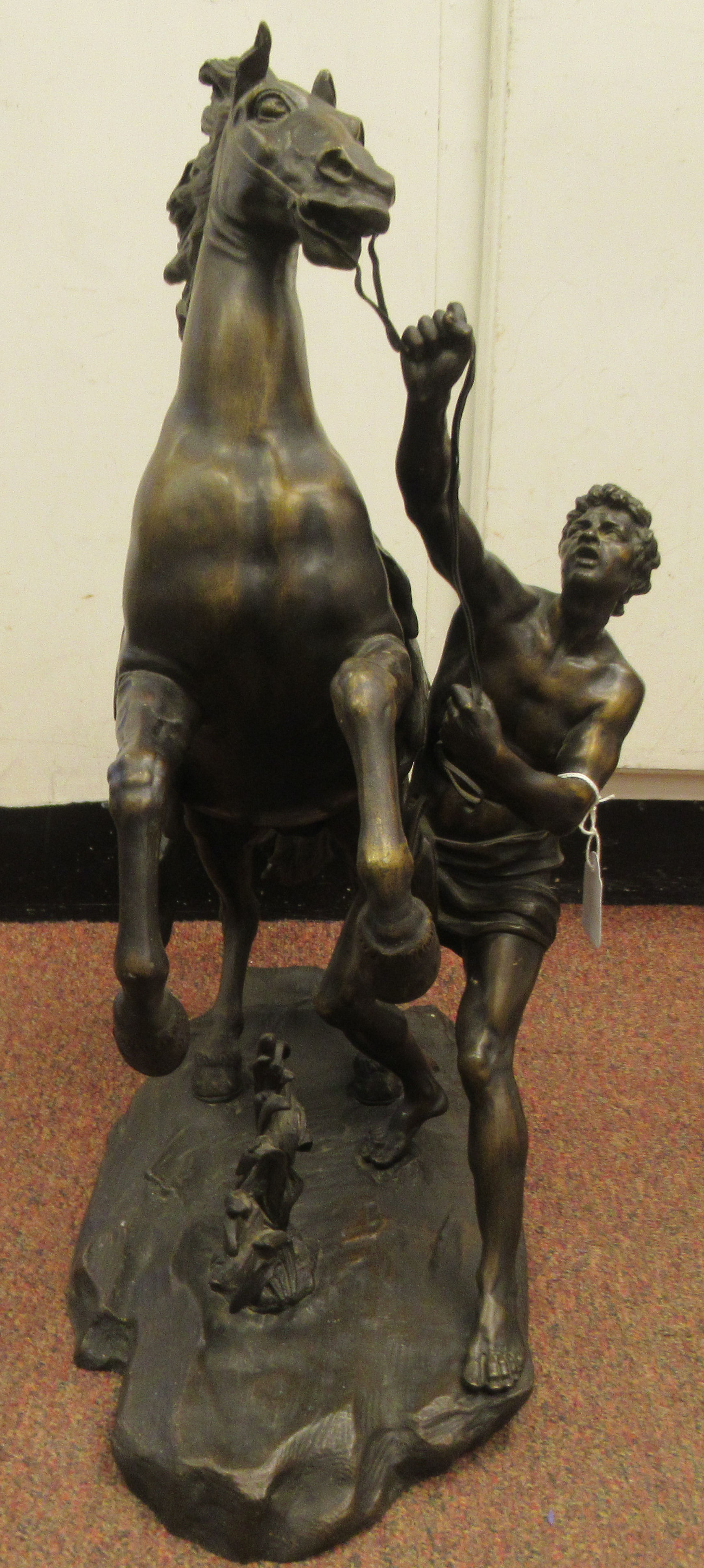 After Guillaume Couston - a cast and patinated bronze statue, a Marly horse and attendant  23"h - Image 2 of 7