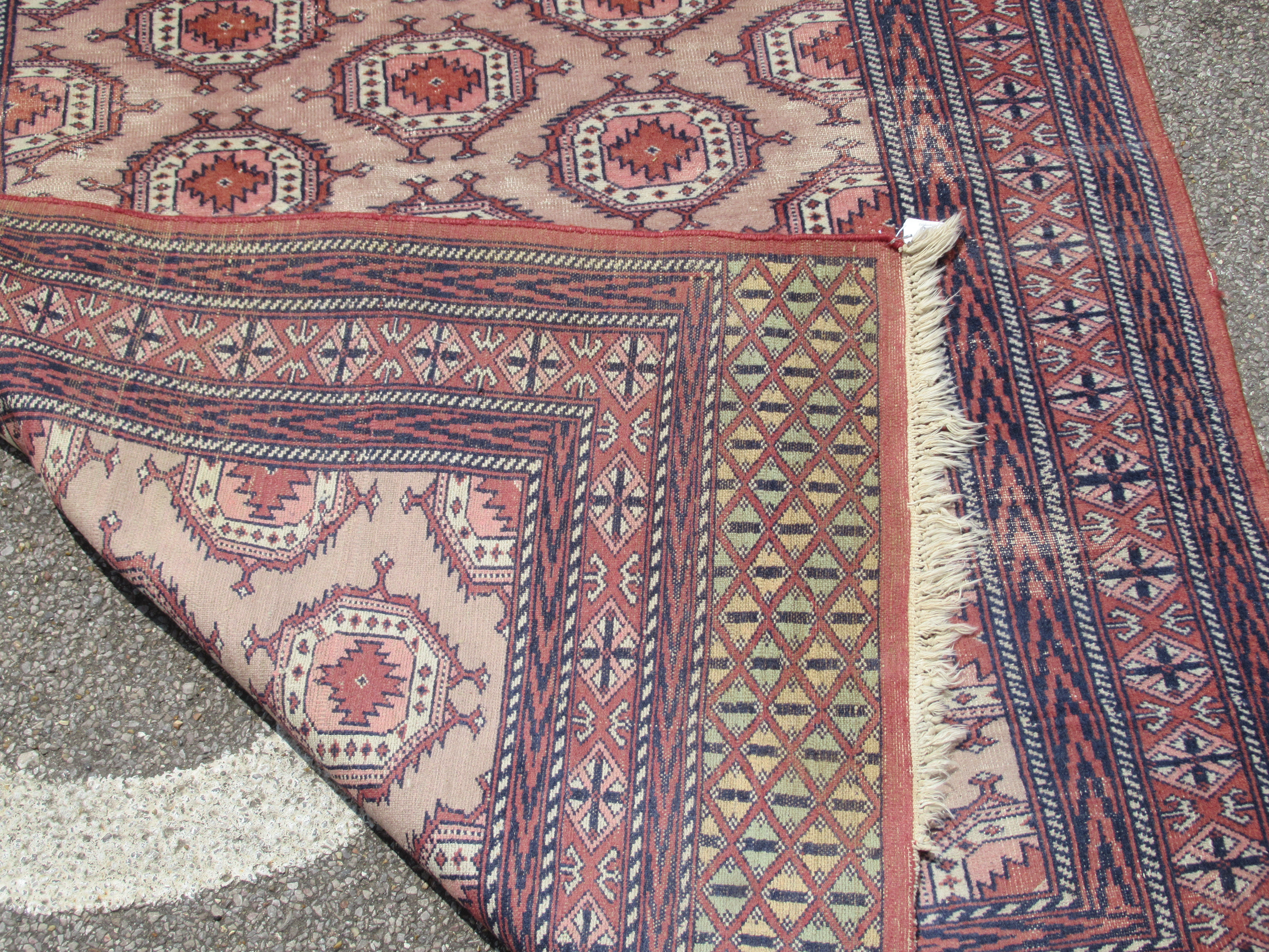 A Bokhara rug, decorated with staggered octagonal motifs, on a multi-coloured ground  48" x 72" - Bild 5 aus 5