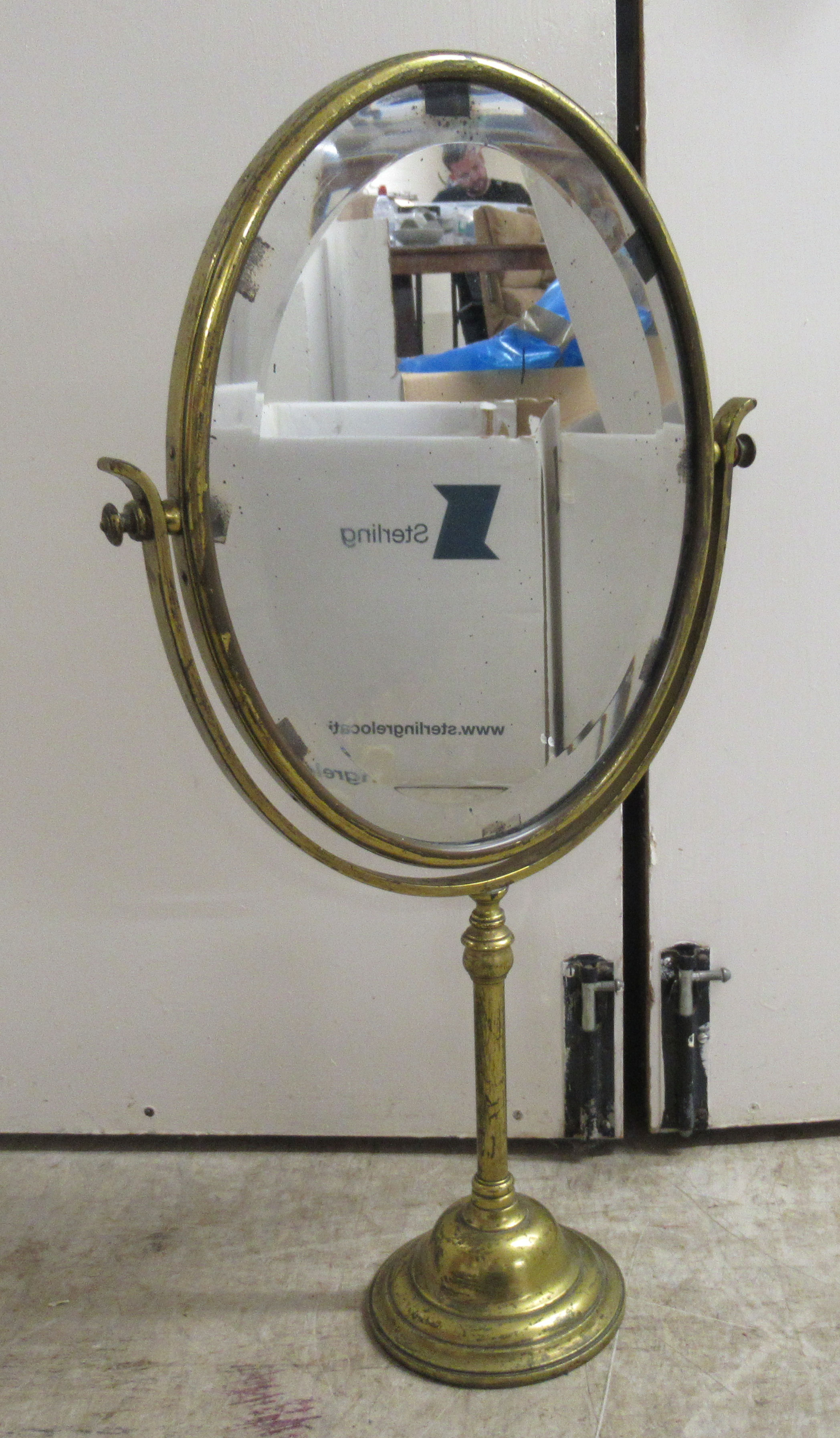 An early 20thC brass framed dressing room toilet mirror, the bevelled plate pivoting/rotating on a - Image 2 of 5