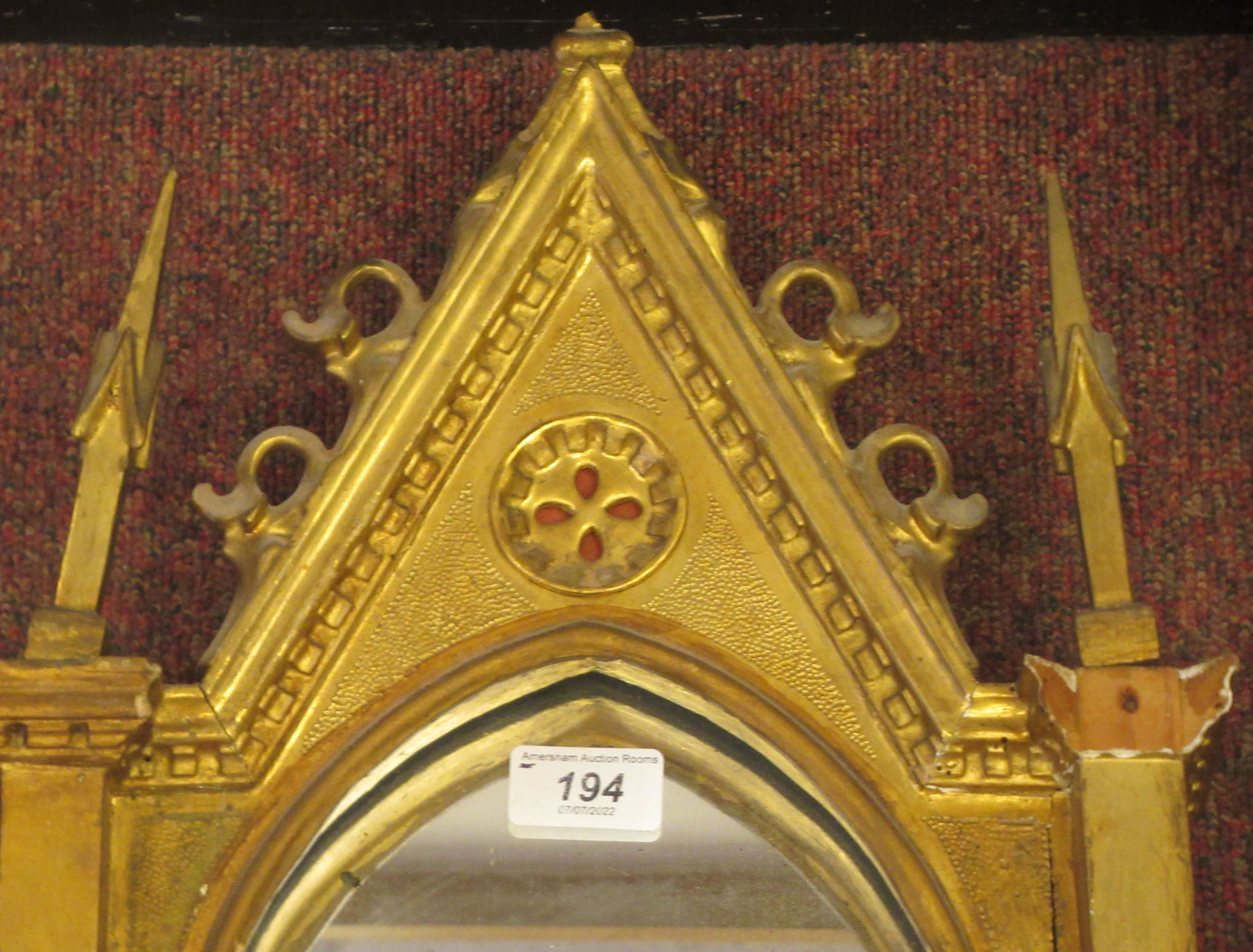 A 19thC Continental carved giltwood and gesso framed niche mirror of gothic design with a painted - Image 2 of 4