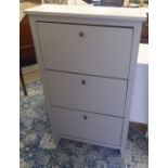 An Ikea grey painted shoe rack with three fall front cupboards, raised on block feet  48"h  27"w