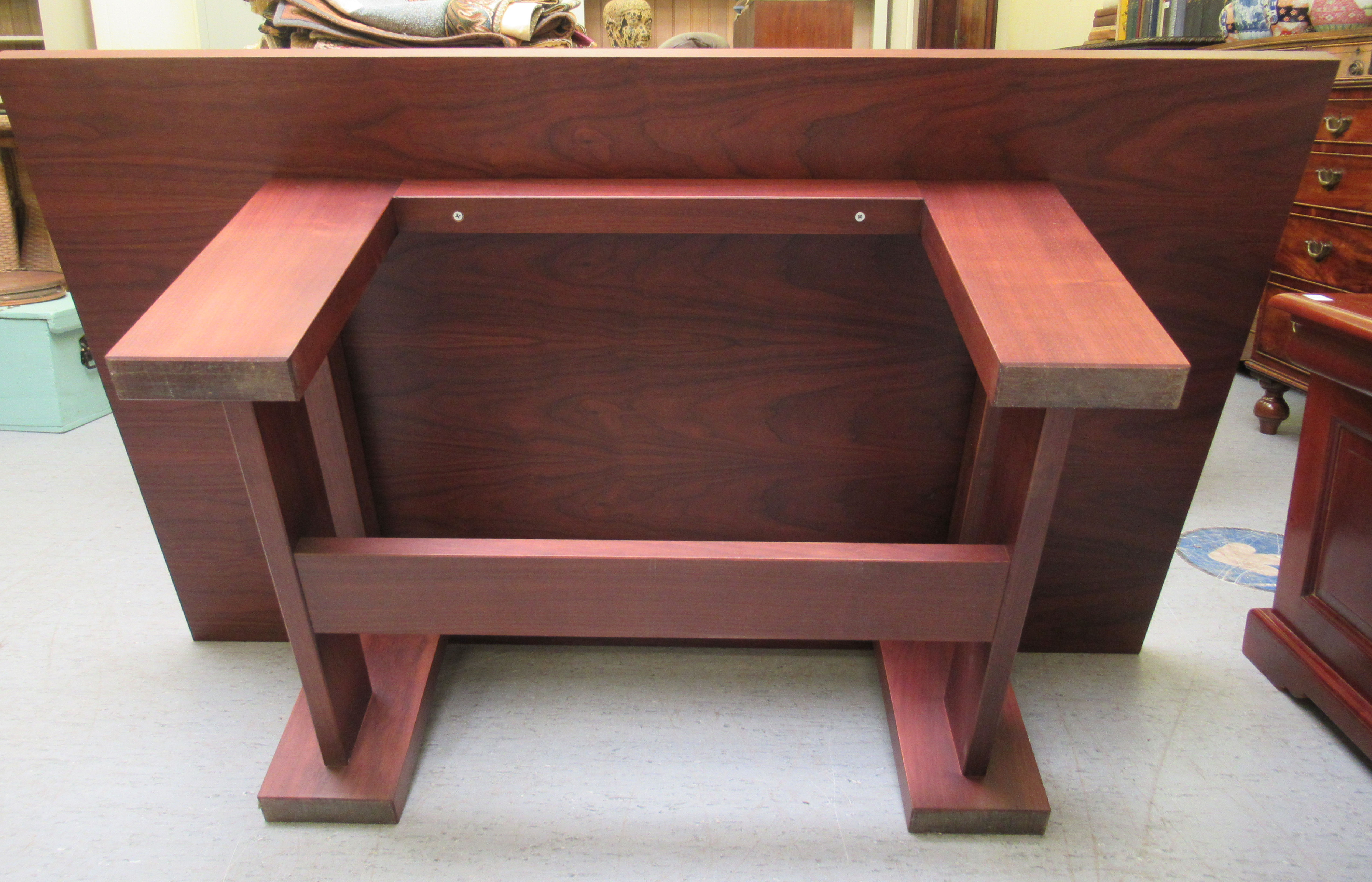 A modern teak coffee table, raised on block legs  16"h  51"w  31"deep - Image 3 of 3