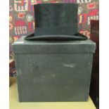 A PR of London black silk top hat  interior 8" front to back  6" side to side  boxed