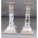 A pair of 25thC Dresden porcelain candlesticks, handpainted with birds, flora and gilding  7"h
