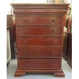 A modern mahogany six drawer dressing chest, raised on bracket feet  43"h  31"w