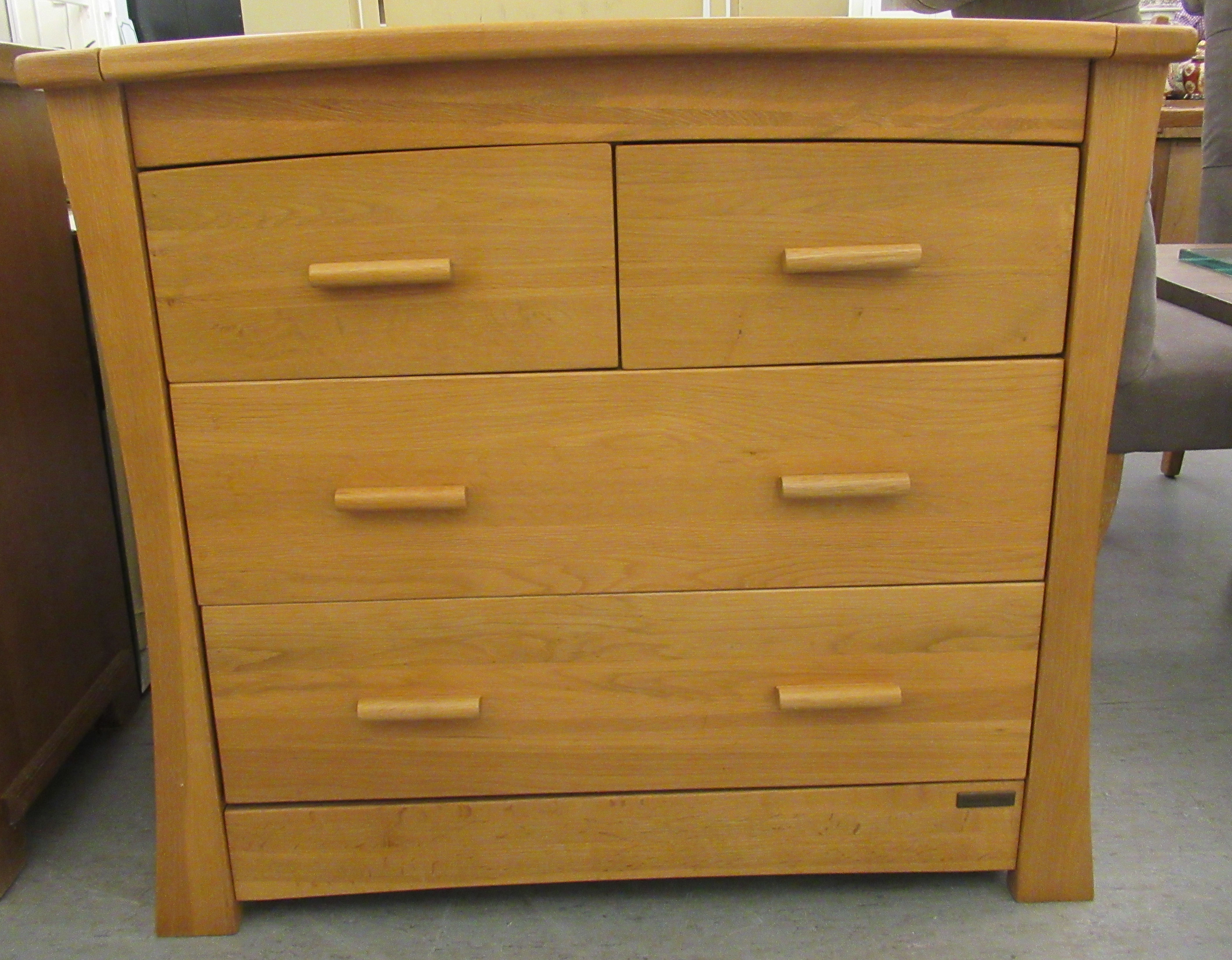 A Mamas & Papas light oak changing station with two short/two long drawers, raised on block feet