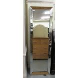 A modern freestanding cheval mirror, on an easel back  58"h