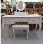 A Laura Ashley white painted three drawer kneehole dressing table, raised on cabriole legs  30"h