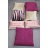 Variously sizes, fabric and patterned cushions