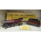 A Bassett-Lowke scale clockwork model 0 gauge 4-4-6 locomotive and tender, in maroon LMS livery