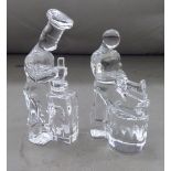 Two Orrefors Swedish clear, cast glass figures, viz. a blacksmith at his anvil  5.25"h; and a