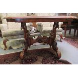 A late Victorian crossbanded mahogany centre table, the top with a moulded breakfront edge, raised