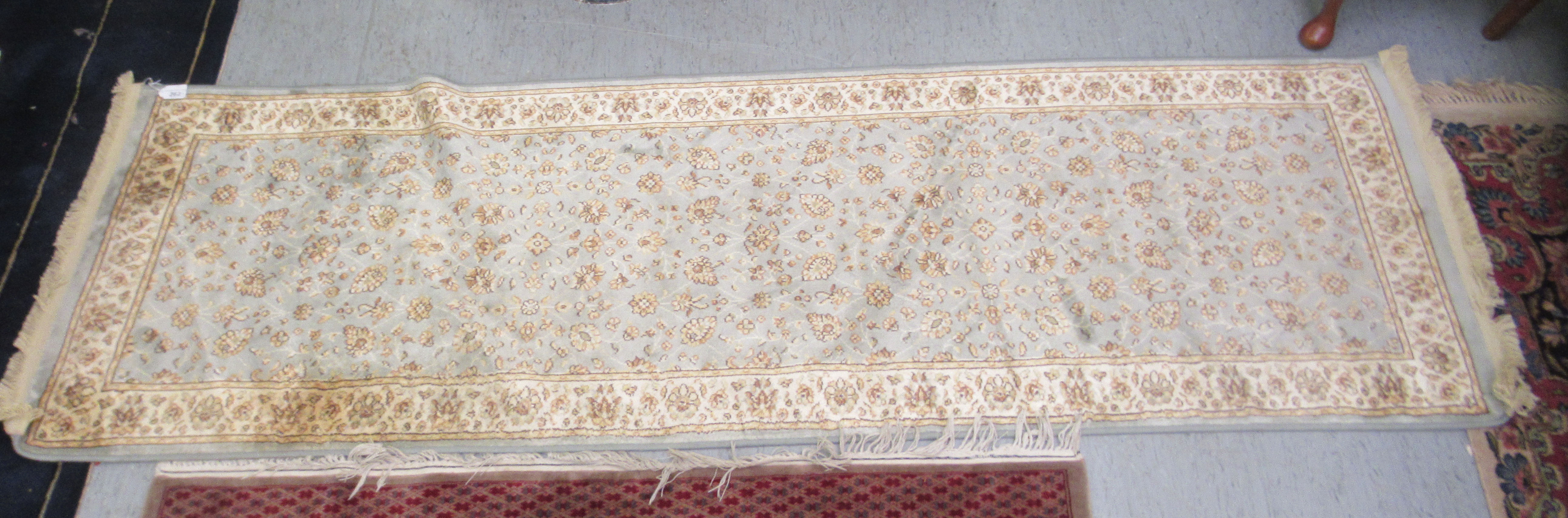 A Bokhara rug, on a multi-coloured ground  52" x 82"; and a machine made Baluchi runner  26" x 84" - Bild 4 aus 6