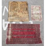 A Chinese part silk washed woollen rug  24" x 48"; a Bokhara rug, on a red ground  48" x 68"; and