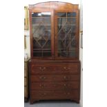 A George III satinwood and marquetry secretaire cabinet-on-chest with two astragal glazed doors,