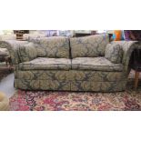 A Kintore 80 Knole two person settee, cushioned upholstered in Greensmith foliate pattern fabric