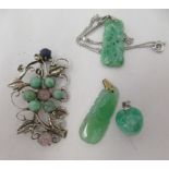 A 9ct white gold jade necklace; a jade pendant; a silver and jade set brooch; and a green stone
