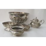 Silver and white metal collectables: to include a pedestal bowl; a loaded candlestick  7"h; and