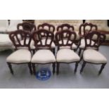 A set of eight Victorian inspired mahogany framed chairs with open backs and upholstered seats,