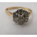 An 18ct bi-coloured gold diamond set cluster ring