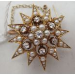 A 15ct gold star design brooch, set with diamonds and seed pearls