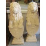 A pair of composition stone heraldic lions  30"h
