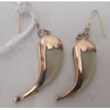 A pair of 9ct gold mounted claw design pendant earrings