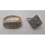 A platinum and diamond set cluster ring; and a gold coloured metal pave set diamond ring