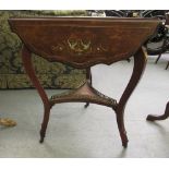 A late Victorian rosewood and marquetry occasional table of triangular form with three equal