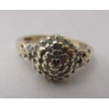 A 9ct gold diamond cluster ring