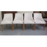 A set of four modern tub style salon chairs, upholstered in studded ivory coloured suede effect