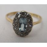 An 18ct gold aqua and diamond set ring