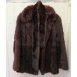 A chocolate brown fur box jacket; and a mink collar