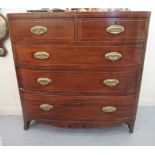 A late Victorian string inlaid mahogany bow front dressing chest with two short/three graduated long