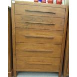 A modern stained oak tallboy, the five graduated long drawers with bar handles, raised on extended