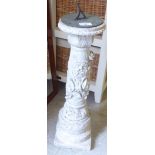 A composition stone pedestal sundial  24"h