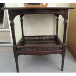 An Edwardian string inlaid and marquetry mahogany galleried, two tier occasional table, raised on