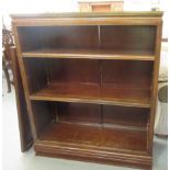 A modern teak open front bookcase with height adjustable shelves, on a plinth  42"h  36"w
