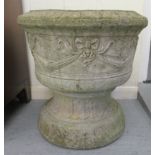 Two part composition stone planters, each bowl decorated with ribbon ornament  22"h  22"dia