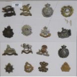 Sixteen regimental cap badges and other insignia, some copies: to include Irish Lights,