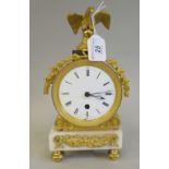 A Regency white marble and gilt metal marble timepiece, in the style of Vulliamy, in a drum design