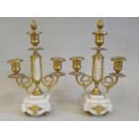 A pair of mid 19thC white marble and gilt metal sidepiece candelabra, each comprising three