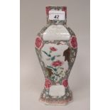 A 19thC Chinese porcelain vase of waisted rectangular outline and baluster form with canted corners,