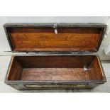 A 19thC pine and hide covered chest with straight sides, a hinged lid and rivetted ornamental iron