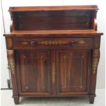A Regency rosewood chiffonier with inlaid brass ornament, the low upstand incorporating a shallow