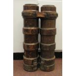 A 19thC stickstand, later fashioned as a conjoined pair of moulded hide ammunition carriers with